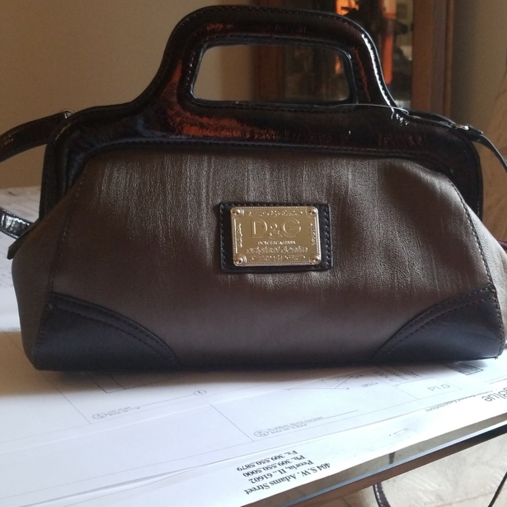 Never worn metallic dark chocolate maroon purse
